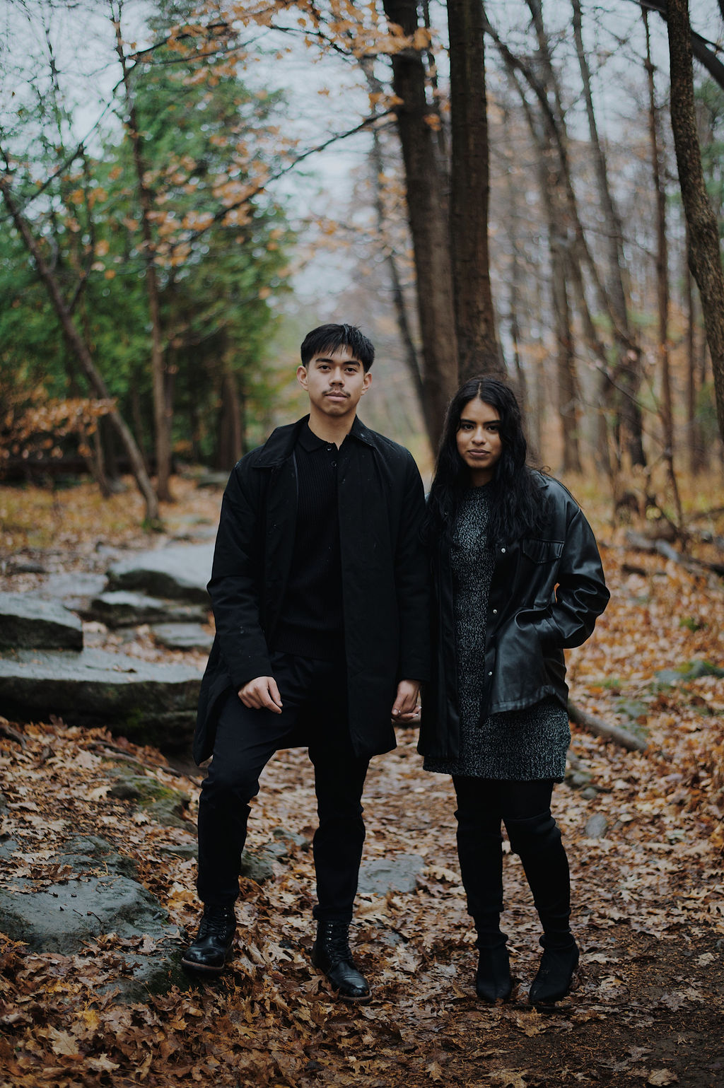 Standing together in the fall trees